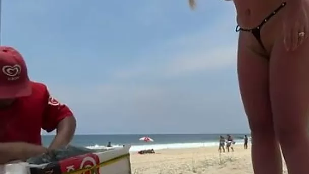 This whore is comfortable wearing thong bikini and she's got a nice ass