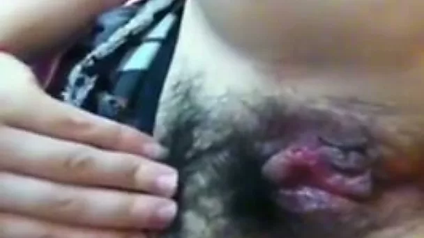 Dirty amateur Asian slut with hairy pussy masturbates on the webcam