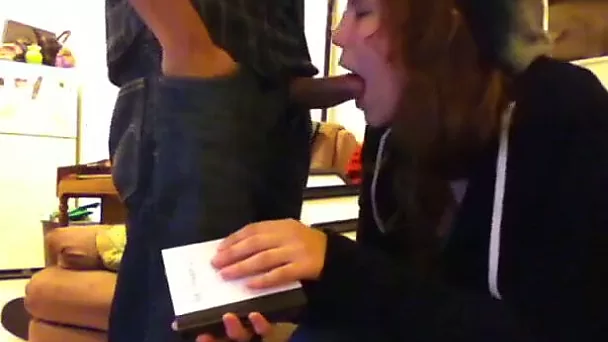 Adorable and joyful redhead college girl sucks dick of her friend