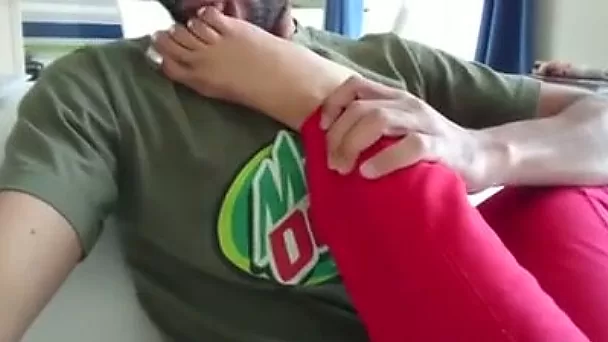 Cute amateur girlfriend teasing her boyfriend with her feet