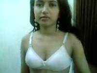 Pretty Indian teeny with perky tits strips for me exposing her shaved pussy