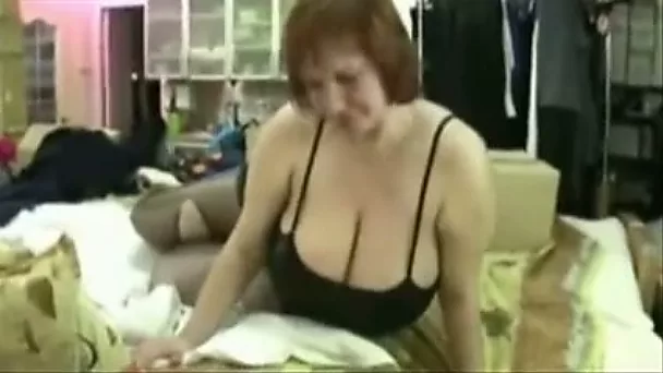 Red haired mom with huge boobies masturbating in front of camera