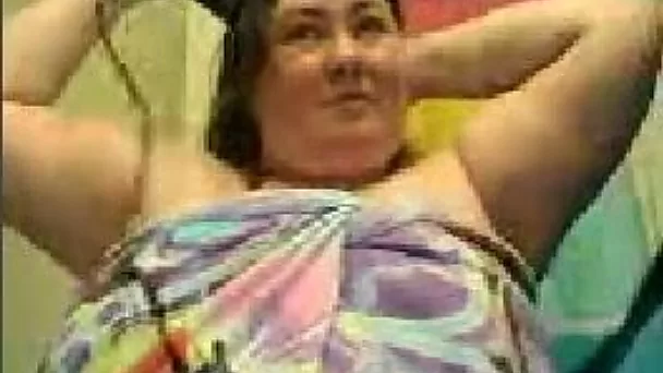 Chubby lady exposed her big saggy tits while brushing her teeth