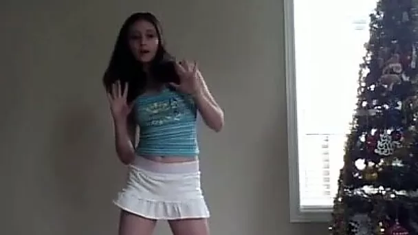 Cute fresh teen in blue top and short white skirt was dancing for me