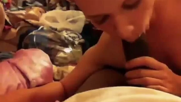 Pretty horny black head happily smiles while sucking my buddy's BBC