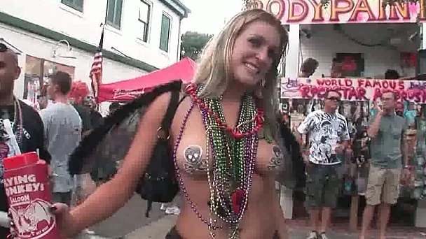 Sexy babes showing off their hot body painting outdoors