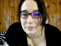 Chubby brunette MILF in glasses was chatting with my buddy on webcam