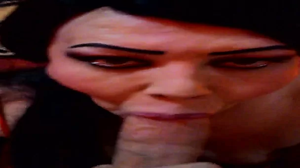 Dark haired cheap whore with ugly makeup gives a stout blowjob