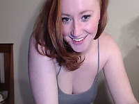 This ginger camgirl is amazing and her face, breasts are all as fine as can be
