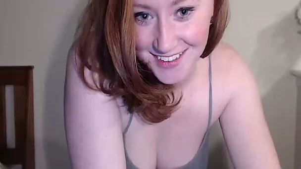 This ginger camgirl is amazing and her face, breasts are all as fine as can be