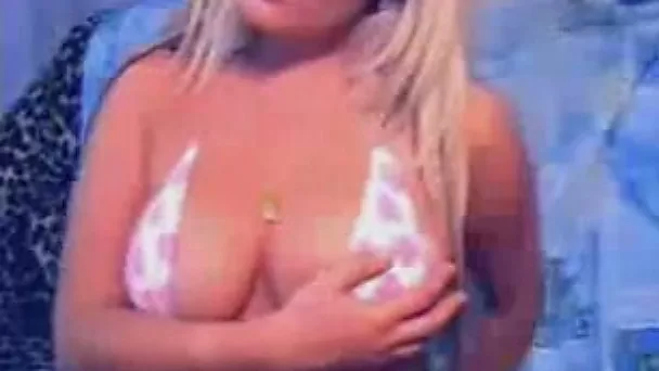 Fabulous blonde GF stripteases on the webcam flashing