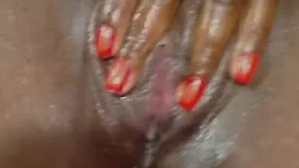 Some wet ebony shaved pussy closeup looking delicious