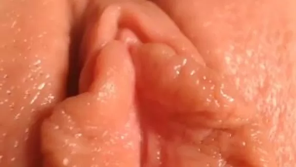 Horny slut gives a close up view by using her vaginal speculum