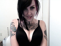 This busty tattooed webcam model is absolutely gorgeous from head to toe