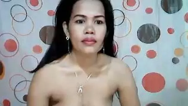 Lusty amateur Filipina nympho with natural tits plays with her bald cunt