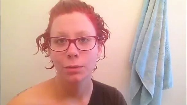 This pink haired four eyed slut likes to shave her pussy in the shower