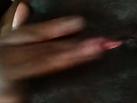 Extreme closeup video of a bit hairy pussy being teased with fingers