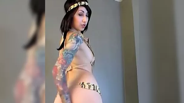 Tattooed well shaped amateur emo nympho teases her own pussy