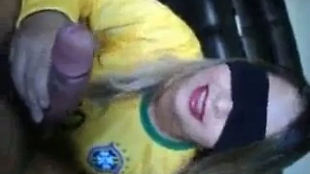 Blindfolded girlfriend with pale face takes cock in mouth for a blowjob