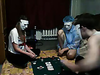 Masked friends play cards and undress one by one on webcam