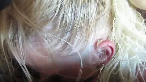That blonde is sucking my dick in my car and she's so sensual and enthusiastic