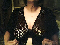 Amateur mature short haired bitch in knitted black nightie shows huge tits