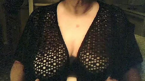 Amateur mature short haired bitch in knitted black nightie shows huge tits