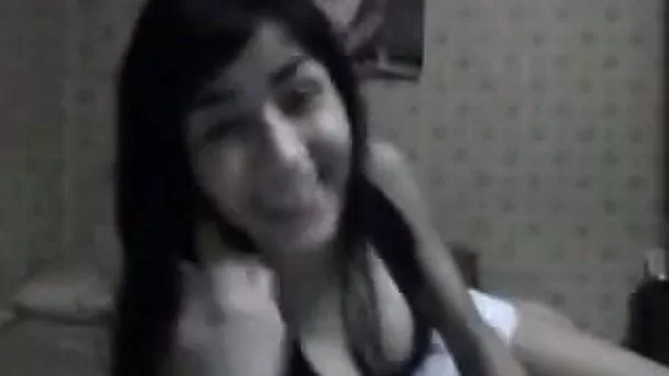 Cute and busty latina teen chats with her boyfriend on webcam