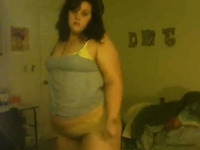Skanky brunette BBW webcam chick strips exposing her curves