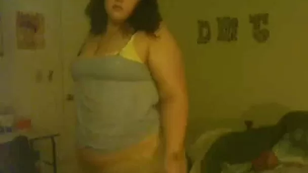 Skanky brunette BBW webcam chick strips exposing her curves