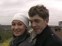 Amateur Russian couple having a walk outdoors on cold day