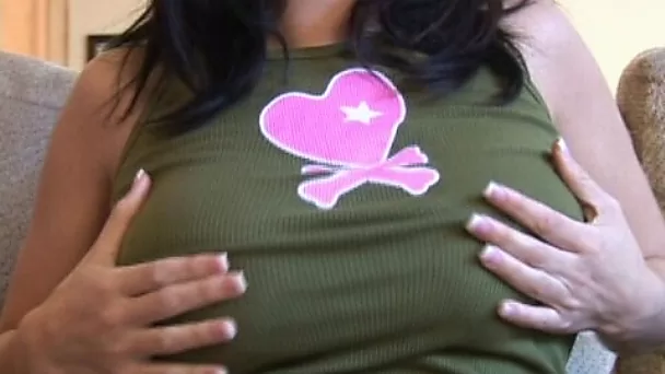 Natural busty brunette Mia lifts shirt and plays with round boobs
