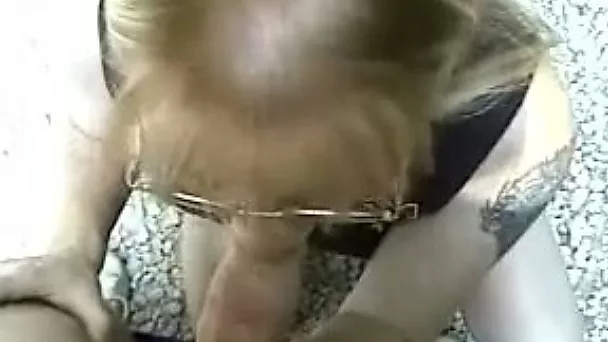 This four eyed whore isn't shy about giving a stranger a blowjob