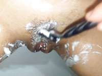 My friend helps his kinky girlfriend to shave her hairy cunt