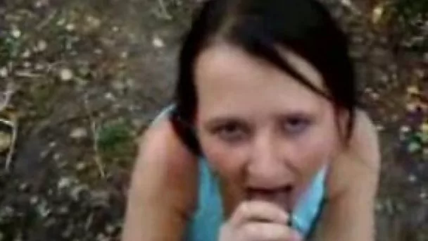 Fugly short-haired hooker is sucking my dick outdoor