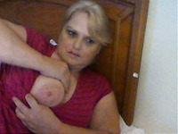 Bosomy blond mom mauls her huge jugs while flirting through webcam
