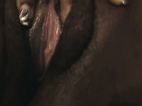 Close up sex scene of spoiled whore rubbing her slit with dildo