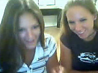 Two young college chicks from the girls dorm give lesbo show on webcam
