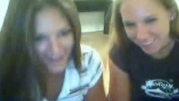 Two young college chicks from the girls dorm give lesbo show on webcam