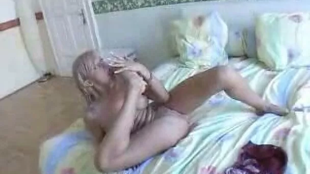 My young and flexible wife posing for amateur erotic clip