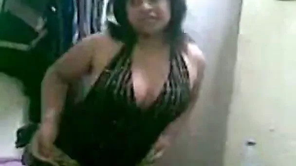 Smoking hot Arab chick with big tits dances for me