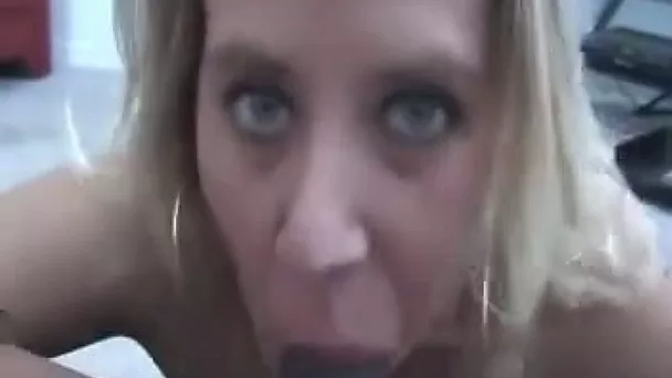 Beautiful Caucasian MILF is sucking my big black cock until I cum on her face