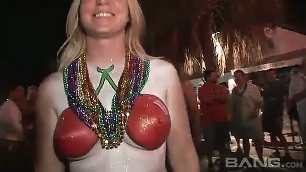 The horny chicks in this video can't wait to show off their tits and body paint
