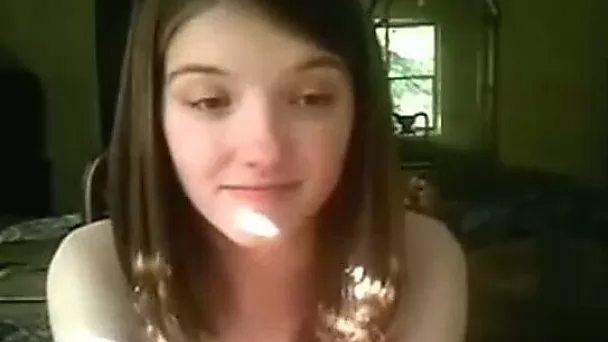 Short haired teen brunette with pretty face masturbates her fresh pussy