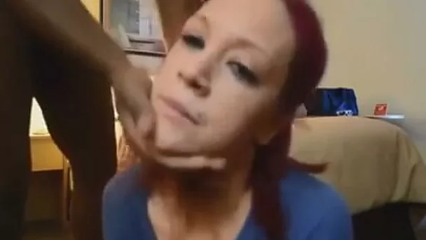 This red haired white chick is enjoying her hunger for my chocolate cock