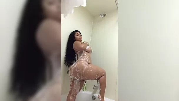 Check out my ex-wife taking a shower and flashing her big boobies