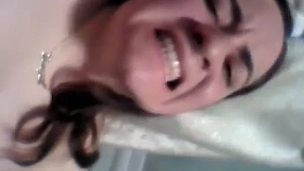 Giggling chick with natural tits flashes her such a nice bald pussy