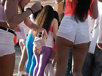 Lots of awesome bubble butts in shorts are taped on cam outdoors