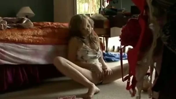 Sitting on the floor nympho with juicy tits pets her wet pussy properly