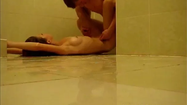 This amateur hoe is getting fucked missionary style on the bathroom floor